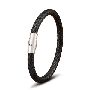 Close-up of black braided leather bracelet with a polished silver magnetic buckle