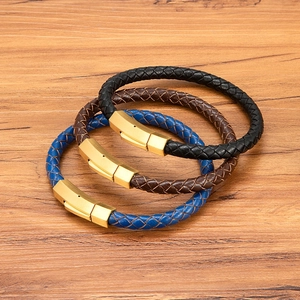 Three men's woven leather bracelets in black, brown, and blue with gold magnetic clasps