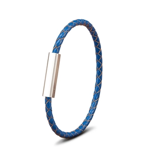 Detail of blue braided leather cord with polished silver magnetic stainless steel clasp
