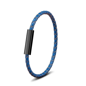 Detail of blue braided leather cord and black magnetic stainless steel clasp on bracelet