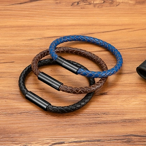 Three men's woven leather bracelets in blue, brown, and black with magnetic metal clasps