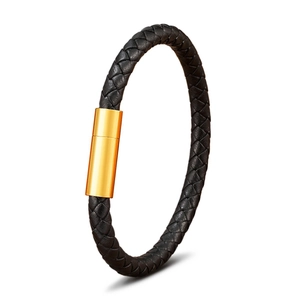 Minimalist black braided leather bracelet with a polished gold magnetic steel clasp