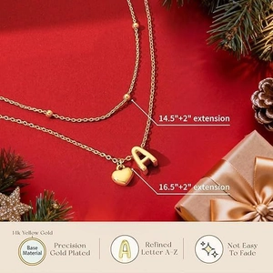 Elegant 14K gold plated layered necklace set with heart and letter A pendant on red background