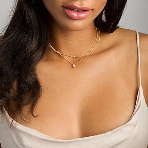 Elegant gold titanium steel layered necklace with a sparkling solitaire diamond pendant