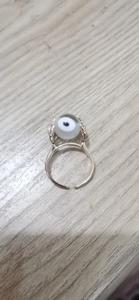 Detail der rotierenden Evil Eye Perle am silbernen verstellbaren Anti-Stress-Ring