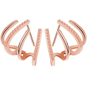 Detail view of luxury rose gold four-claw stud earrings with shimmering zircon stones