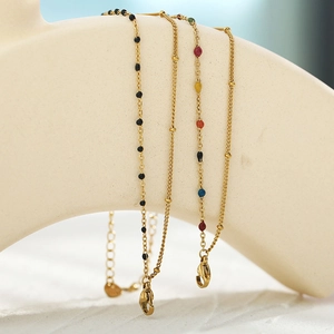 Bracciali a doppio strato placcati oro 14K con perline colorate e chiusura a moschettone