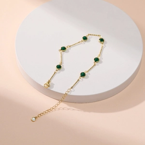 Minimalist 18K gold-plated adjustable anklet with six round green zircon gemstones