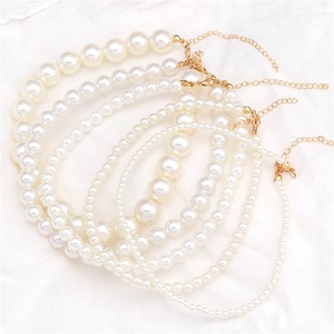 Ensemble de colliers de perles blanches vintage avec fermoirs dorés ajustables