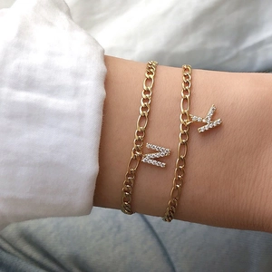 Minimalist gold stainless steel Figaro chain bracelets with micro-pave zircon letters N and K