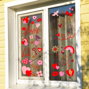 Detailweergave van Valentijnsdag raamstickers met hartjes en vogelontwerpen