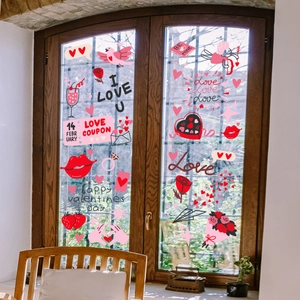 Detailoverzicht van Valentijnsdag raamstickers met Cupido en harten op glas