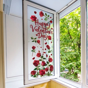 Detail van rode rozen statische raamstickers met Happy Valentine's Day tekst op glas