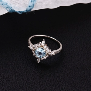 925 silver vintage style ring with sky blue round gemstone and marquise zirconia accents