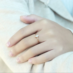 Elegant gold plated S925 silver ring featuring marquise opal and side diamonds