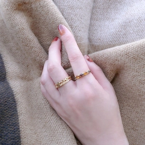 Set de tres anillos de plata S925 bañados en oro con citrino natural y cuarzo ahumado