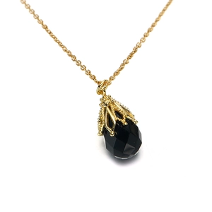 Vintage 925 zilveren ketting met zwarte onyx druppel hanger en gouden holle filigraan details