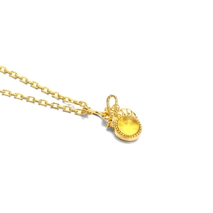 Detailed close-up of S925 sterling silver stamp on bee amber stone pendant necklace