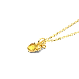 Gold bee pendant necklace for women with yellow gemstone inlay on a thin chain