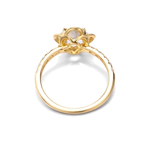 Detailed bottom view of the gold-plated clover ring with a round clear gemstone setting
