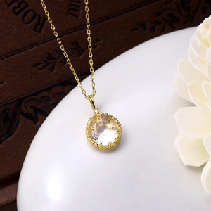 Collier vintage en argent S925 avec pendentif en cristal blanc facetté et fini doré