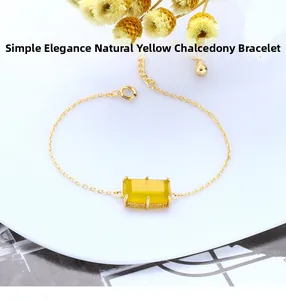 Macro detail of natural yellow chalcedony bracelet with 925 sterling silver chain