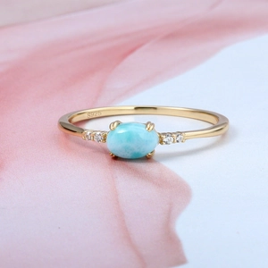 Macro detail of Larimar ring showing S925 silver hallmark and zircon accents