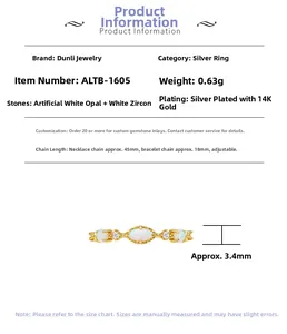 Details van S925 zilveren 14K goud vergulde ring met witte opaal en zirkonia steentjes