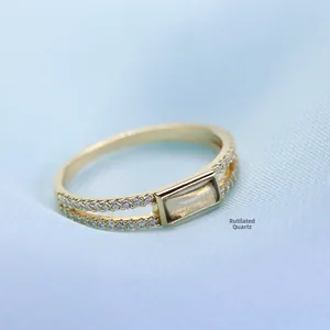 Detailed view of gold plated S925 ring featuring smoky quartz and double row zircons