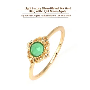 Detailed view of S925 silver 14K gold plated ring with a green agate gemstone