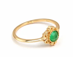 Detailed macro of S925 silver ring with green agate stone and fine petal design