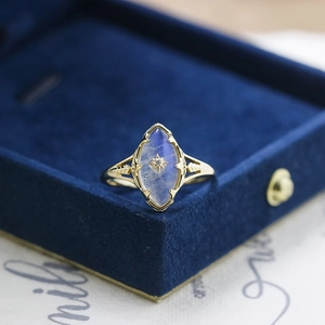 Vintage gold S925 silver ring with marquise labradorite and star engraving in a velvet box