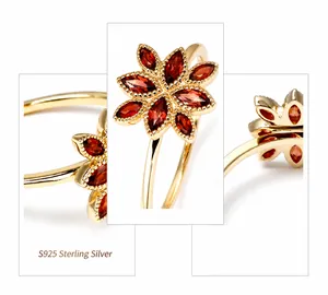 Detailed close-up of S925 sterling silver flower ring with red marquise gemstones