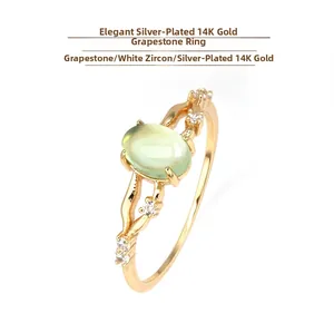 Detail view of 925 sterling silver ring with oval prehnite stone and small zircons