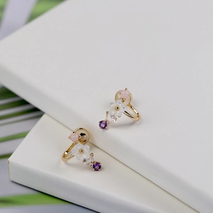 Close-up of S925 gold-plated earrings with shell flower and pink crystal pendants