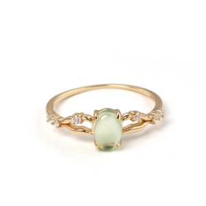 Elegant 925 sterling silver gold plated ring with oval green prehnite and side stones