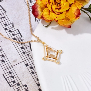 Vintage style gold-plated silver kite pendant with white crystal and opals on music notes