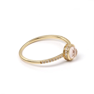 Elegant gold plated silver ring featuring a pink quartz teardrop stone and pavé diamonds