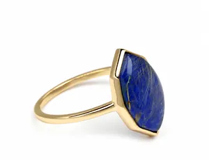 Detailed close-up of a marquise-cut lapis lazuli stone set in a vintage gold S925 ring