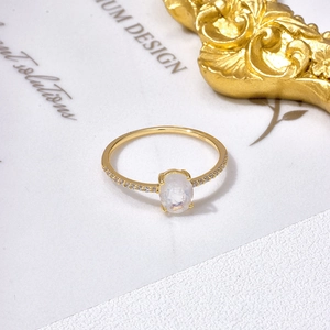 Minimalist S925 sterling silver ring with oval moonstone and small diamonds in gold finish