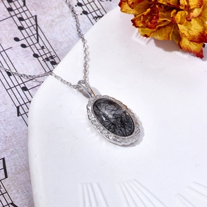 Elegante Halskette aus S925 Sterlingsilber mit ovalem Anhänger aus schwarzem Rutilquarz
