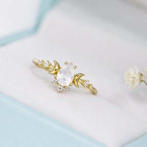 Elegant gold S925 silver ring with teardrop opal stone and crescent moon accents