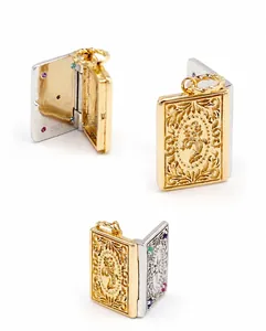 Detailed close-up of a vintage S925 silver locket pendant with floral engravings