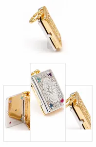 Macro detail of S925 sterling silver book locket with vintage engravings and gems