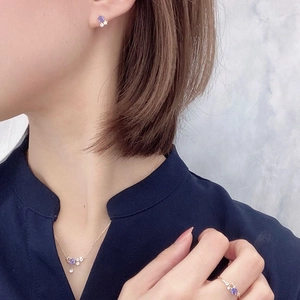 Set di gioielli in argento S925 placcato oro con gemme viola e motivi a stella