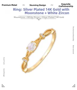 Macro detail of S925 silver 14K gold plated ring with moonstone and white zircons