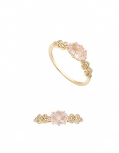Detailed view of an S925 silver ring featuring pink quartz and floral side accents