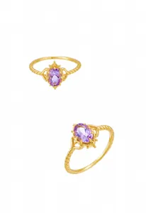 Detailed close-up of vintage gold crown ring with oval purple amethyst and S925 engraving