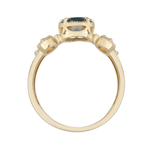 Bague minimaliste avec topaze bleue de Londres et opale dans une monture vintage en or