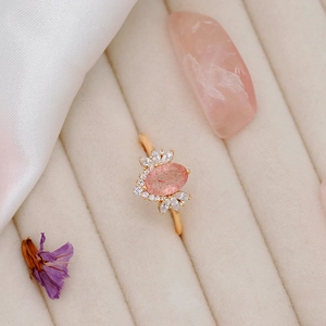 Close-up of pink strawberry quartz ring with zircon in a luxury S925 silver setting